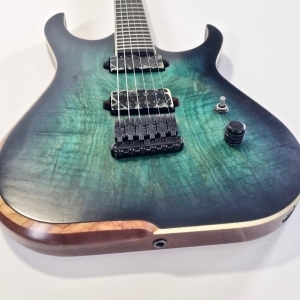 Skervesen Raptor 6 Deep Ocean Poplar Burl 2012