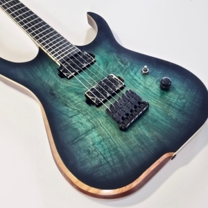 Skervesen Raptor 6 Deep Ocean Poplar Burl 2012